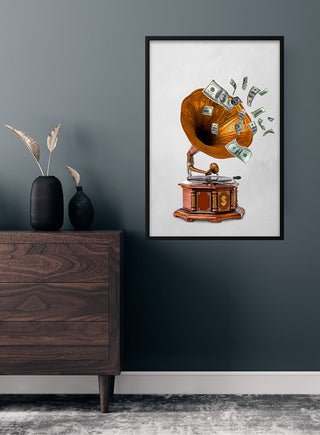 Poster showing a gramophone playing flying dollar bills, displayed above a wooden dresser in a modern room.
