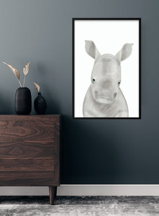 Cute rhino poster for children, featuring a gentle watercolor illustration of a baby rhinoceros in soft tones.
