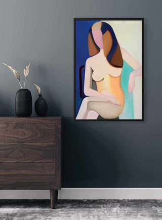 Framed "En Kvindelig Model" by Wilhelm Lundstrøm displayed on a dark wall above a wooden dresser.