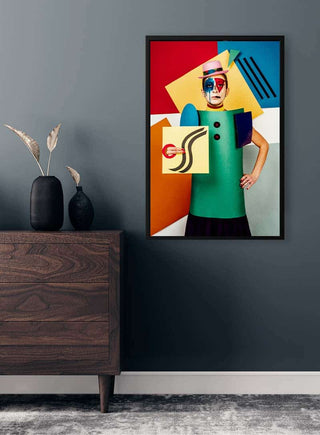 Framed Suprematist portrait of Lena Naymkina Plakat hanging on a dark wall above a wooden dresser.