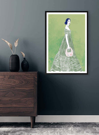 Framed Sky Of Dreams - Elara Monet print showing a woman in a striped dress holding flowers on a green background.