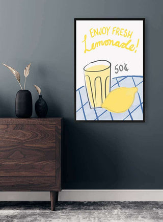 Framed poster showing a glass of lemonade and a lemon with the text "Enjoy Fresh Lemonade! 50¢."