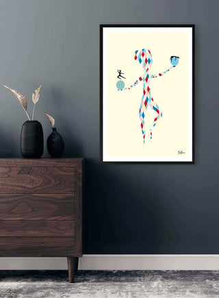 Framed "Balance of Life" artwork by Sara Sonne displayed on a dark wall above a wooden dresser.