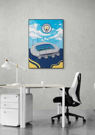 City of Manchester Stadium football poster hanging on a wall above a modern office desk and chair.