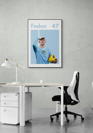 Phil Foden Man City Football Poster displayed on a wall above a modern office desk and chair.