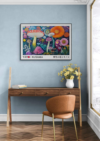 Colorful "Shrooms n Flowers 01 - Kusama Plakat" art print on wall above a modern wooden desk and chair.