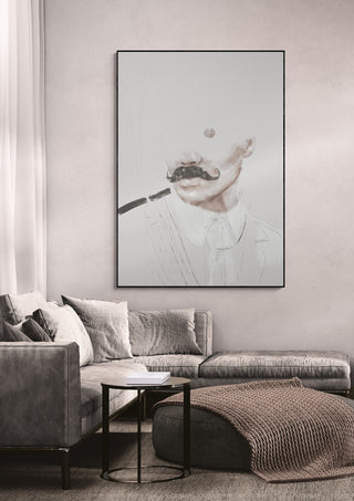 Man - Gabriella Roberg artwork featuring an abstract portrait with a mustache, displayed above a modern sofa.