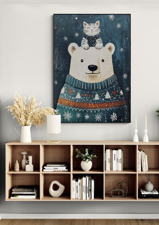 Framed Polar Bear Wonderland art featuring a polar bear and cat, displayed above a modern wooden shelf in a cozy room.