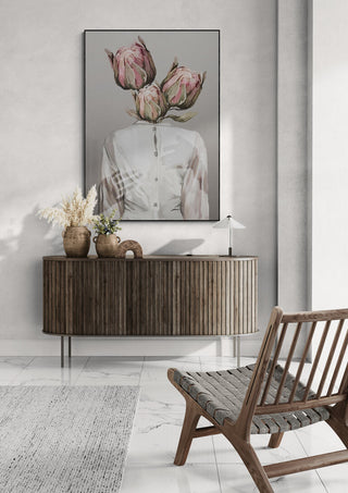 Art print of "Unknown Longing No.I" by Gabriella Roberg featuring a headless figure with blooming flowers.