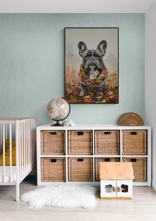 Wall art of a French Bulldog in a colorful poncho, displayed above wicker baskets in a stylish room.