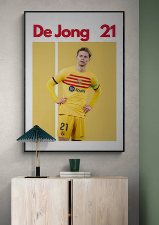 Frenkie de Jong football poster featuring him in a yellow Barcelona kit with "De Jong 21" text above.