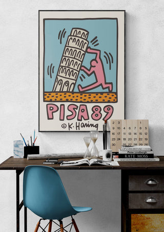 Poster of Pisa’s Leaning Tower with Keith Haring art, featuring a pink figure supporting the tower, labeled “Pisa 89.”