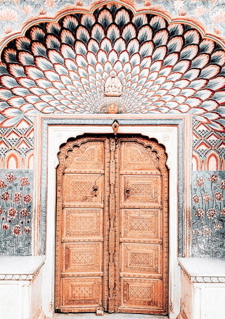Ornate wooden door in Marrakech with intricate carvings and colorful geometric patterns, featured on a decorative poster.