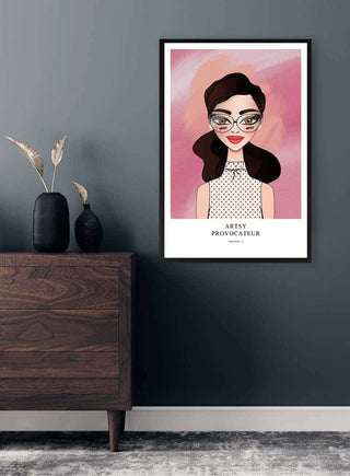 Framed Pink Provocateur - Vincent V. artwork on a grey wall above a wooden dresser with decorative vases.