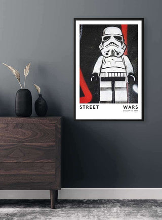 Street Wars Trooper Plakat poster featuring a LEGO-style stormtrooper on a modern living room wall.