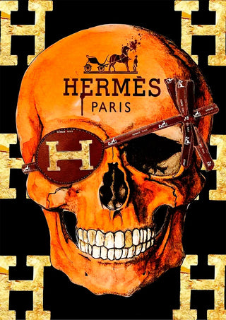 Orange skull with Hermès Paris logo, brown eyepatch, and gold H pattern background for Hermes Skull Plakat.