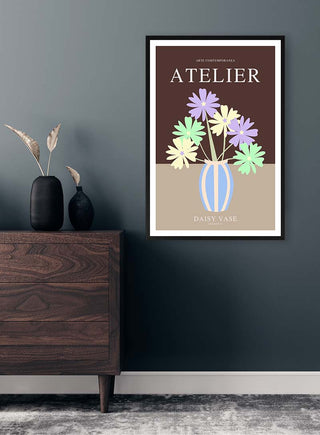 Framed print of Daisy Vase No2 by Vincent V. above a dark wood dresser with minimalist decor items.
