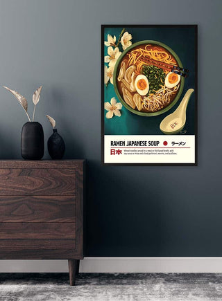 Framed poster of ramen with eggs, noodles, and vegetables, displayed above a wooden dresser on a dark wall.