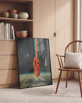 Framed Spacecolor - Frank Moth print featuring a surreal figure in space, displayed in a cozy modern room.