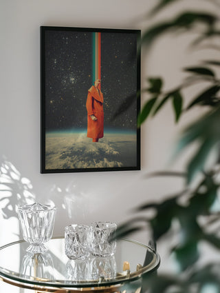 Framed Spacecolor - Frank Moth artwork hanging above a glass table with crystal decor in a modern interior.