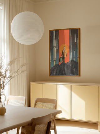 The Departure - Frank Moth artwork framed on a beige wall in a modern, softly lit dining room.