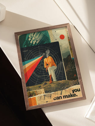 Framed "You Can Make It Right" by Frank Moth with vibrant collage art and cosmic retro design on a table.