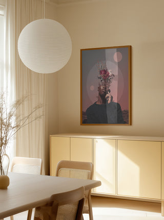 Framed "Pale Memories of Dusk - Frank Moth" artwork hanging in a modern, minimalist dining room.