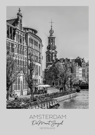 Black and white photo of De Munt tower by a canal in Amsterdam, featured on an In focus: AMSTERDAM product page.
