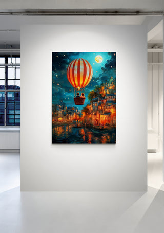 Colorful hot air balloon over a glowing riverside town at night, artwork by Annika Persson titled Good Night.