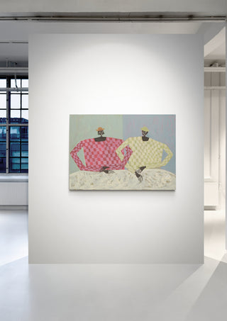 A painting of two figures in checkered shirts, one pink and one yellow, displayed at Studio IMO's Opposites product page.