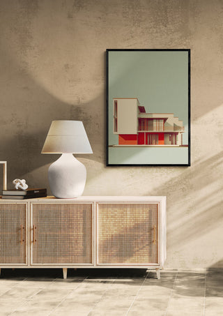 The Beach by David Wolf framed art print displayed above a sideboard with a lamp in a modern room.