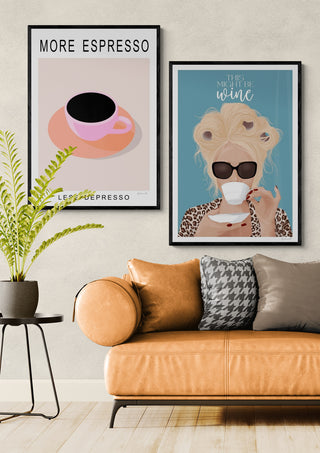 Modern living room with tan sofa, patterned pillows, and More Espresso - ByKammille wall art featuring a pink cup.