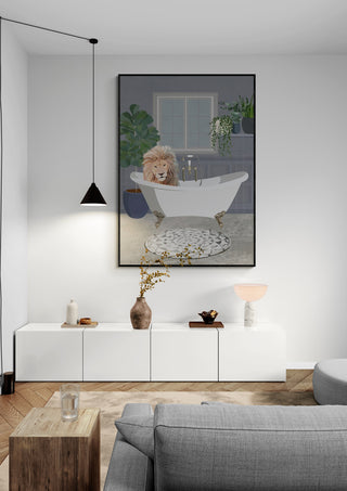 Framed print of "Lion takes a bath" by Sarah Manovski hanging in a modern living room above a white console.