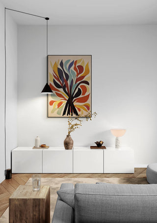 Mystical Mosaic art print featuring bold, colorful abstract shapes above a modern white sideboard in a living room.
