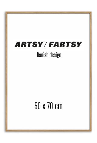 Solid oak frame 50x70 cm with minimalist poster reading "ARTSY / FARTSY Danish design" inside.