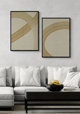 Clay Motion II - Yuli abstract art prints with beige and tan curves, displayed above a modern sofa.